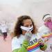 A participant pulls down her head band during the Ypsilanti Color Run on Saturday, May 11. Daniel Brenner I AnnArbor.com